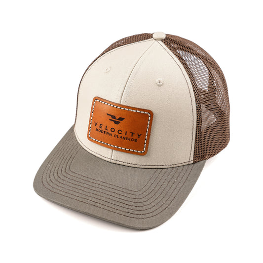 Velocity Icon Leather Patch Trucker Hat